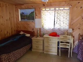 633 Big Boyd Lake Road Milo, ME 04463 - Photo 6 of 11 Bedroom featuring 2 twin beds