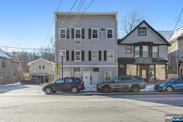 a car parked in front of a house