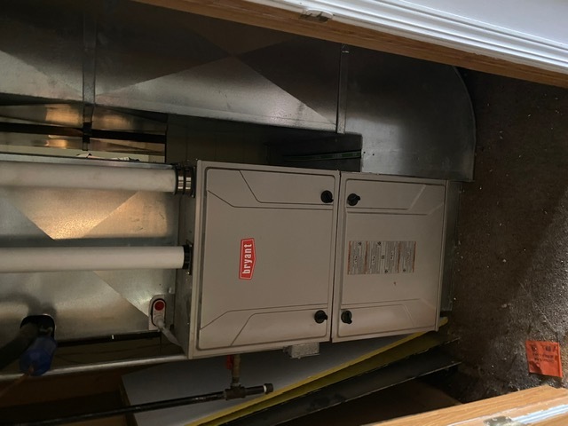 641 Palmyra Road Dixon, IL 61021 - Photo 15 of 22 a room with water heater and a cabinet