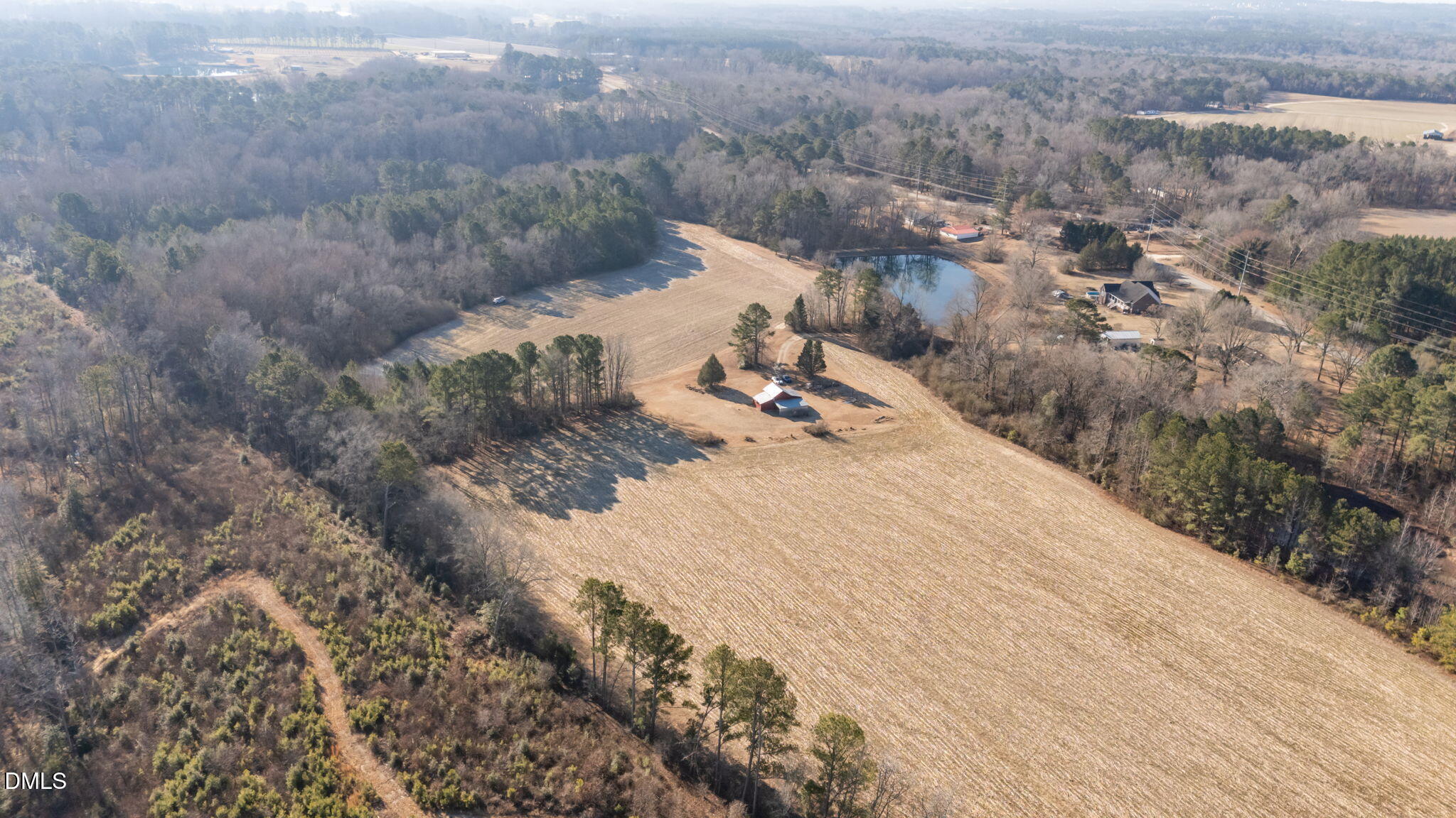 2706 Leaflet Church Road Broadway, NC 27505 - Photo 2 of 11 a view of a dry yard with wooden fence