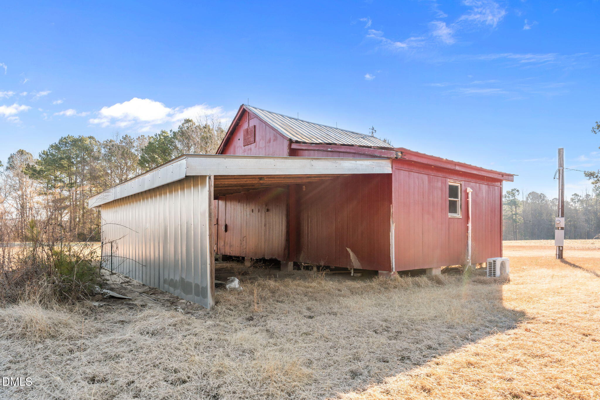 2706 Leaflet Church Road Broadway, NC 27505 - Photo 7 of 11 a backyard of a house with shaded area