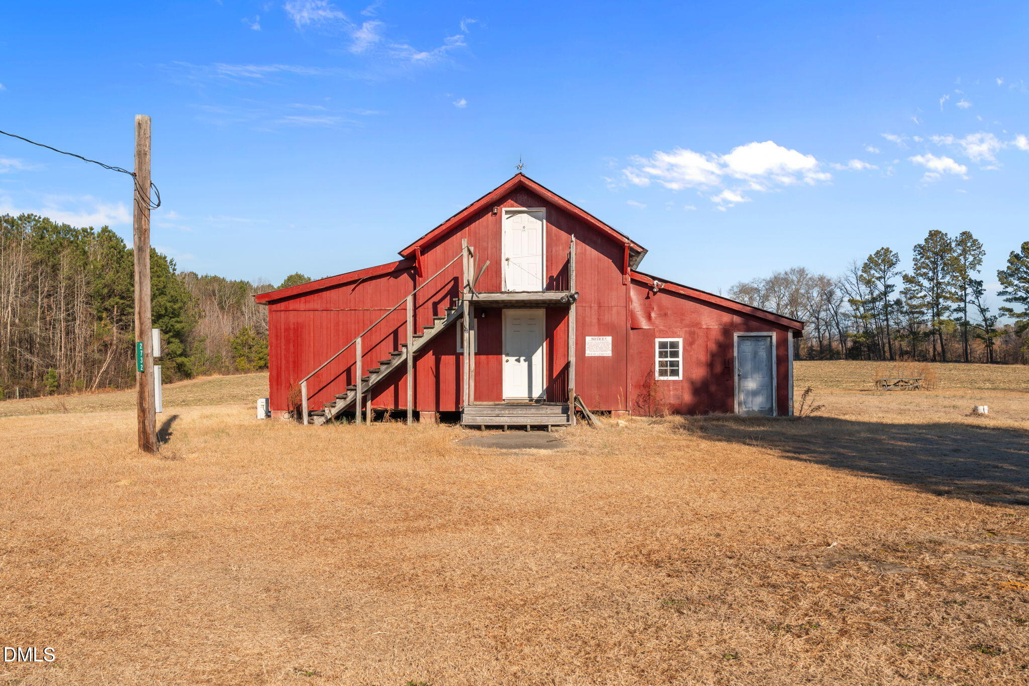 2706 Leaflet Church Road Broadway, NC 27505 - Photo 9 of 11 a view of a house with a snow in the yard