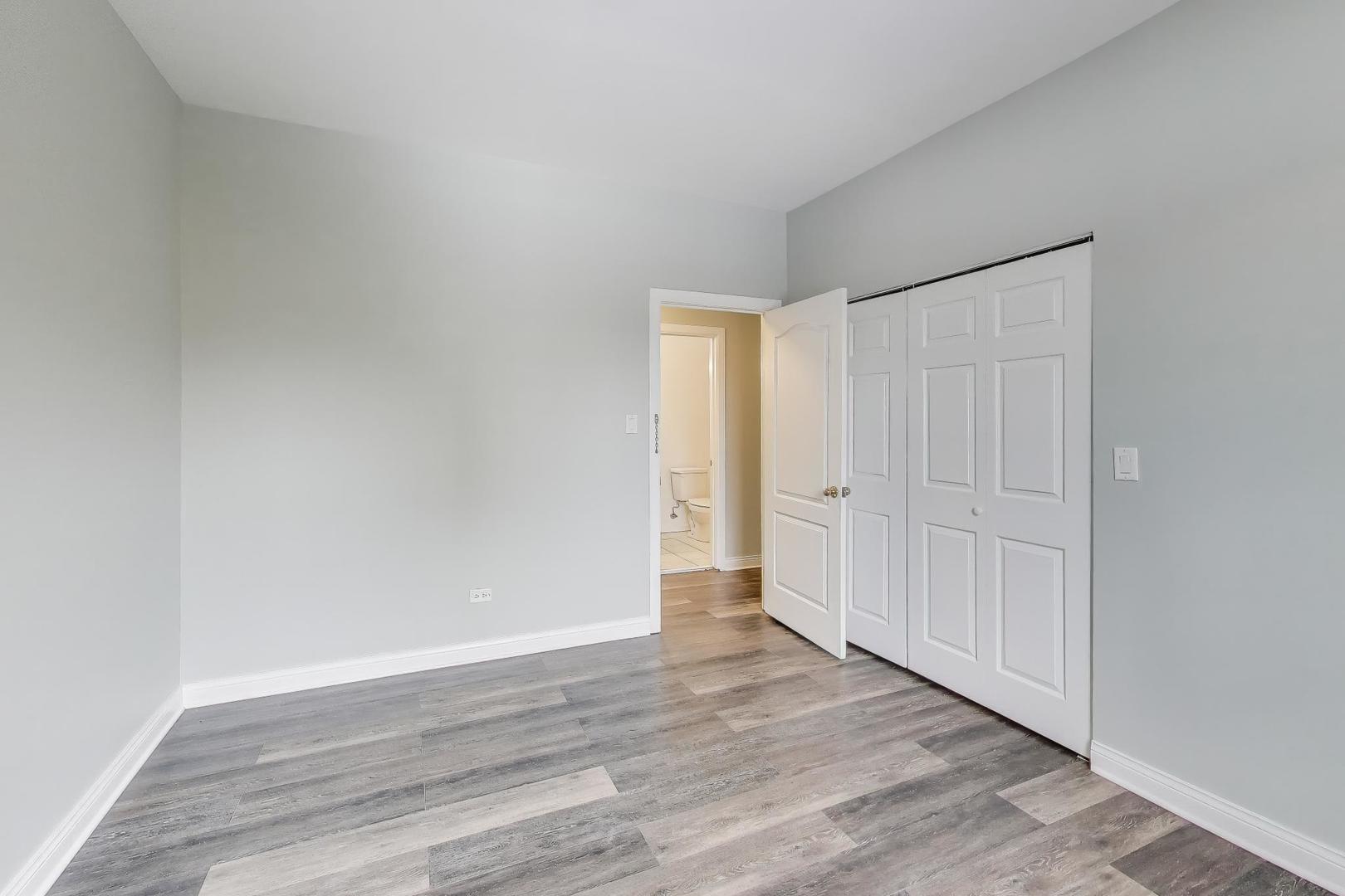 5938 South Indiana Avenue, Unit 2 Chicago, IL 60637 - Photo 10 of 17 a view of an empty room and wooden floor
