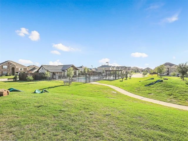 a view of an ocean house swimming pool and outdoor space