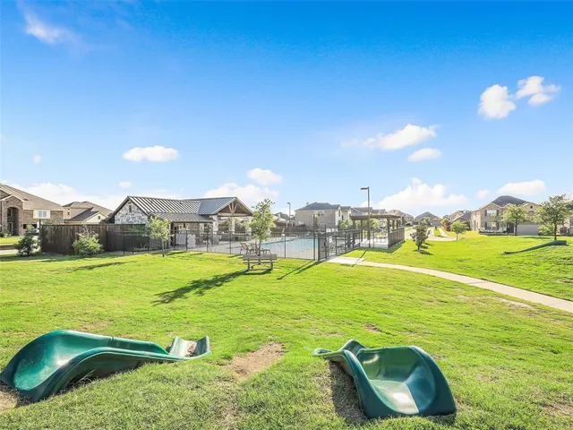 a view of an outdoor space and swimming pool