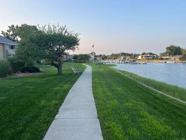 a view of building with outdoor space and seating