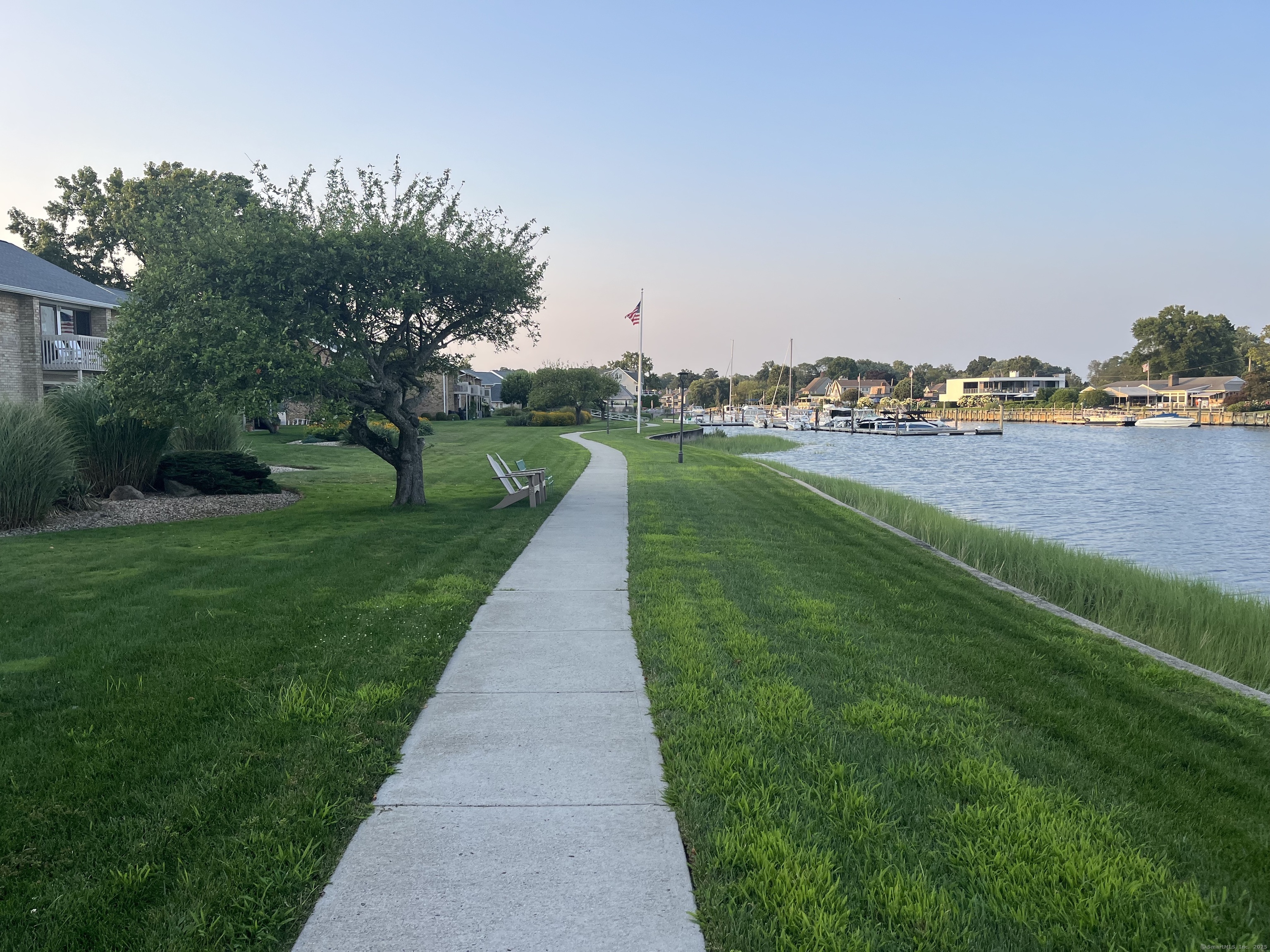 199 Gregory Boulevard, Unit E4 Norwalk, CT 06855 - Photo 17 of 18 a view of building with outdoor space and seating