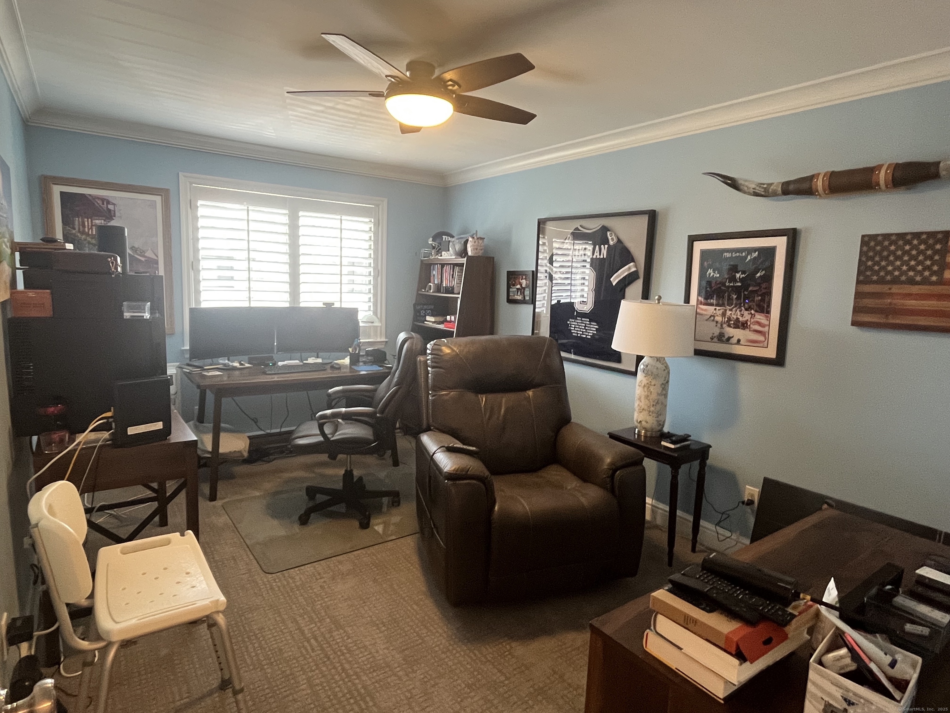 199 Gregory Boulevard, Unit E4 Norwalk, CT 06855 - Photo 9 of 18 a livingroom with workspace couch and a window