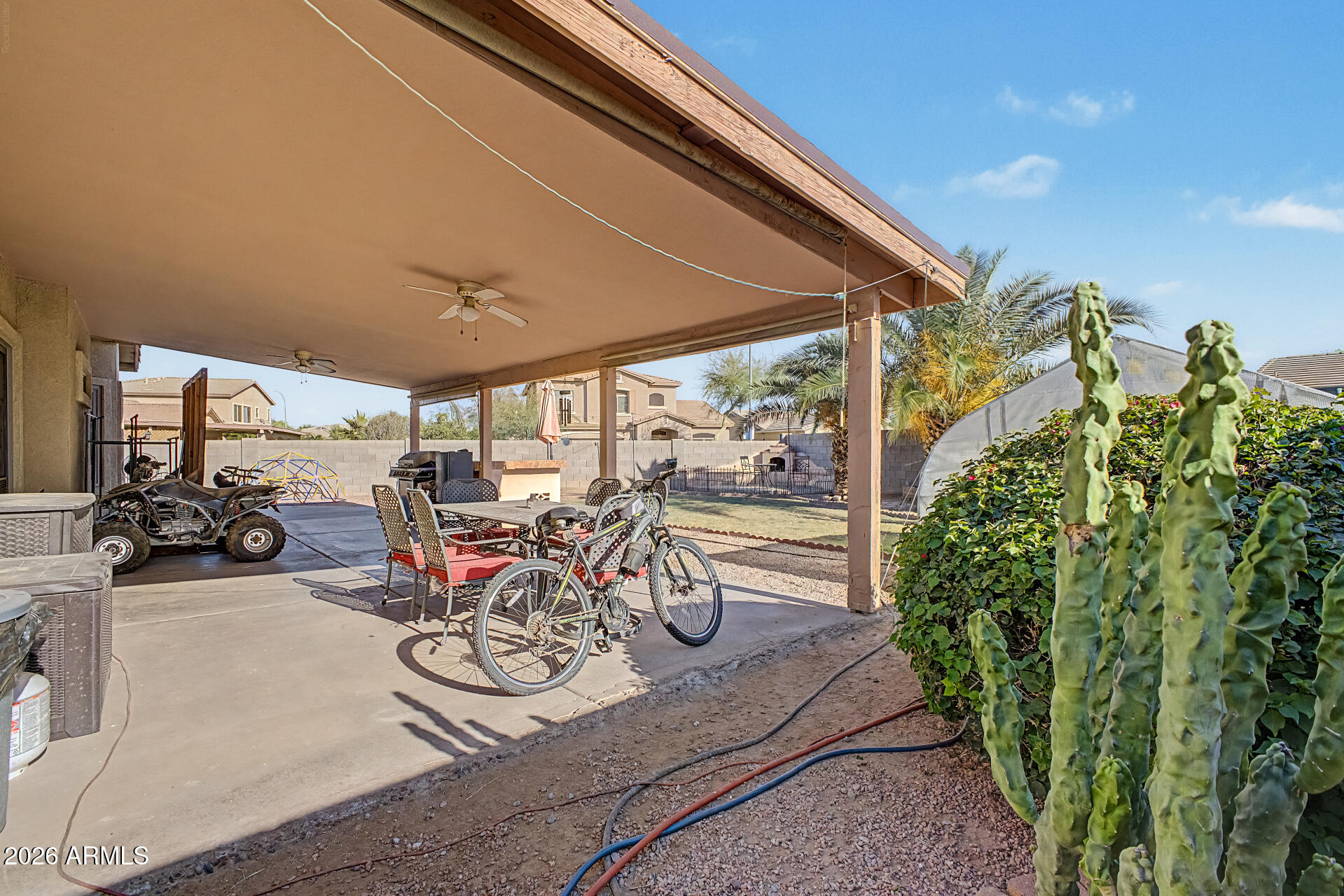 5301 West Grenadine Road Laveen, AZ 85339 - Photo 24 of 37 a view of a room with gym equipment