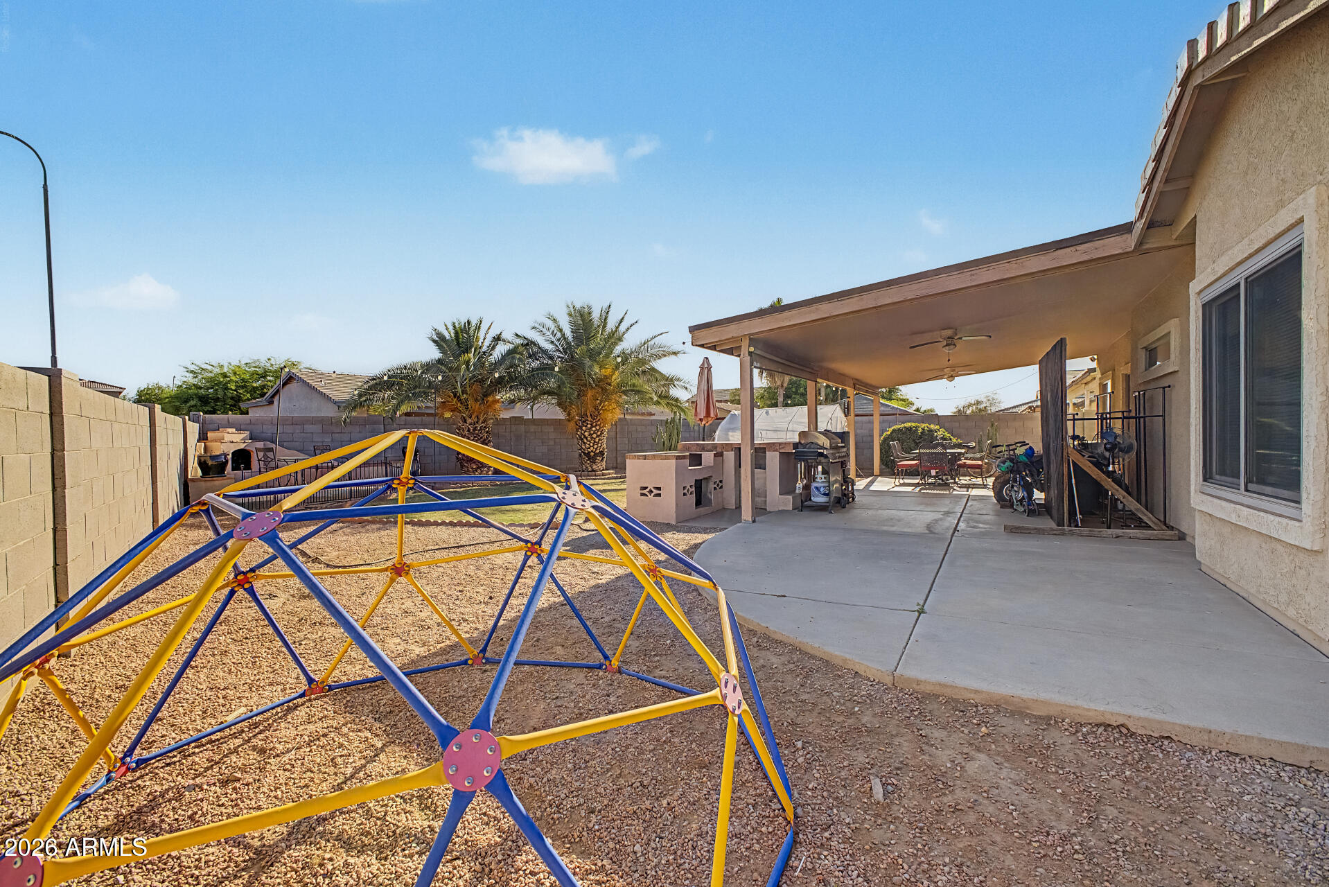 5301 West Grenadine Road Laveen, AZ 85339 - Photo 25 of 37 a patio with a yard
