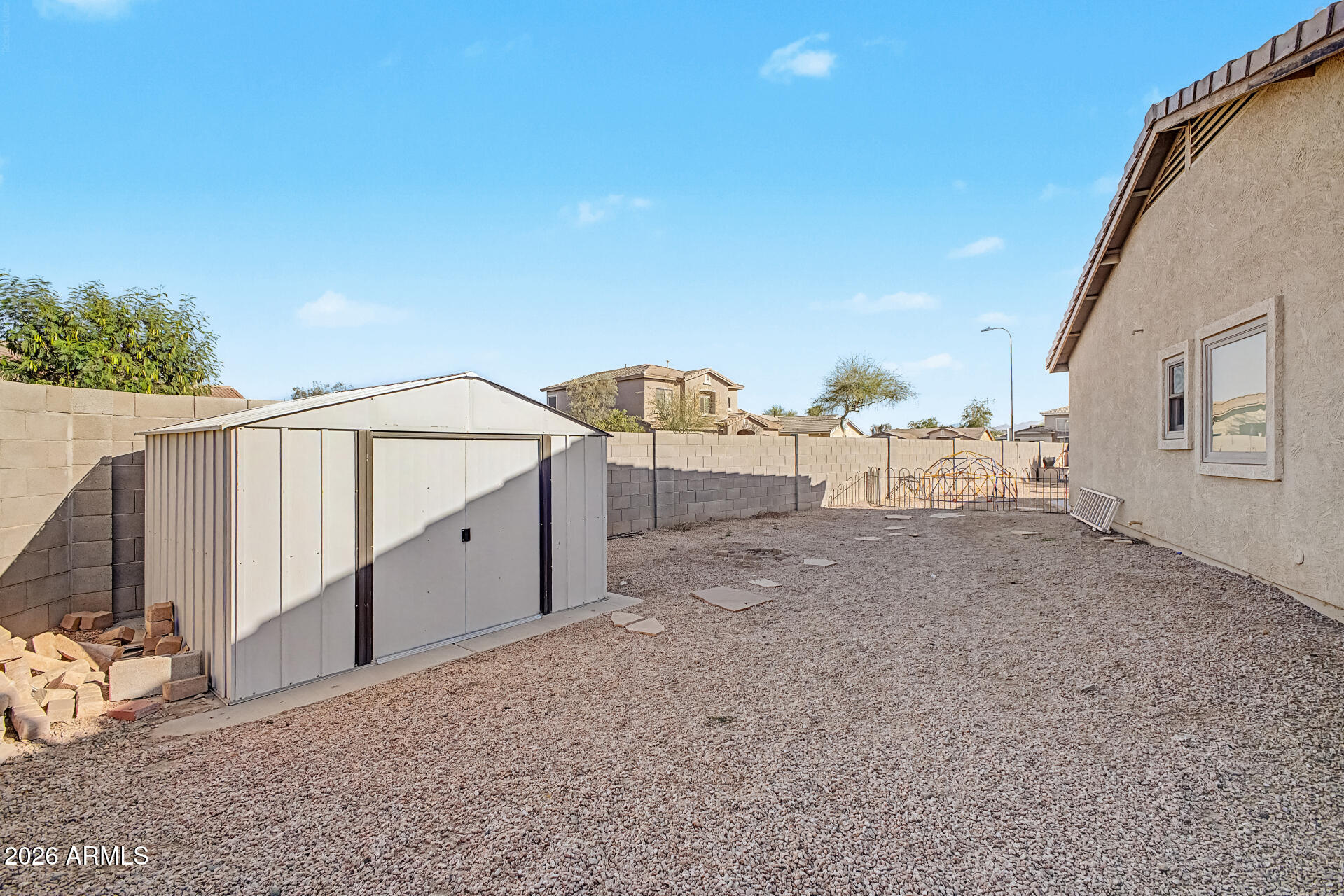 5301 West Grenadine Road Laveen, AZ 85339 - Photo 31 of 37 a view of a backyard