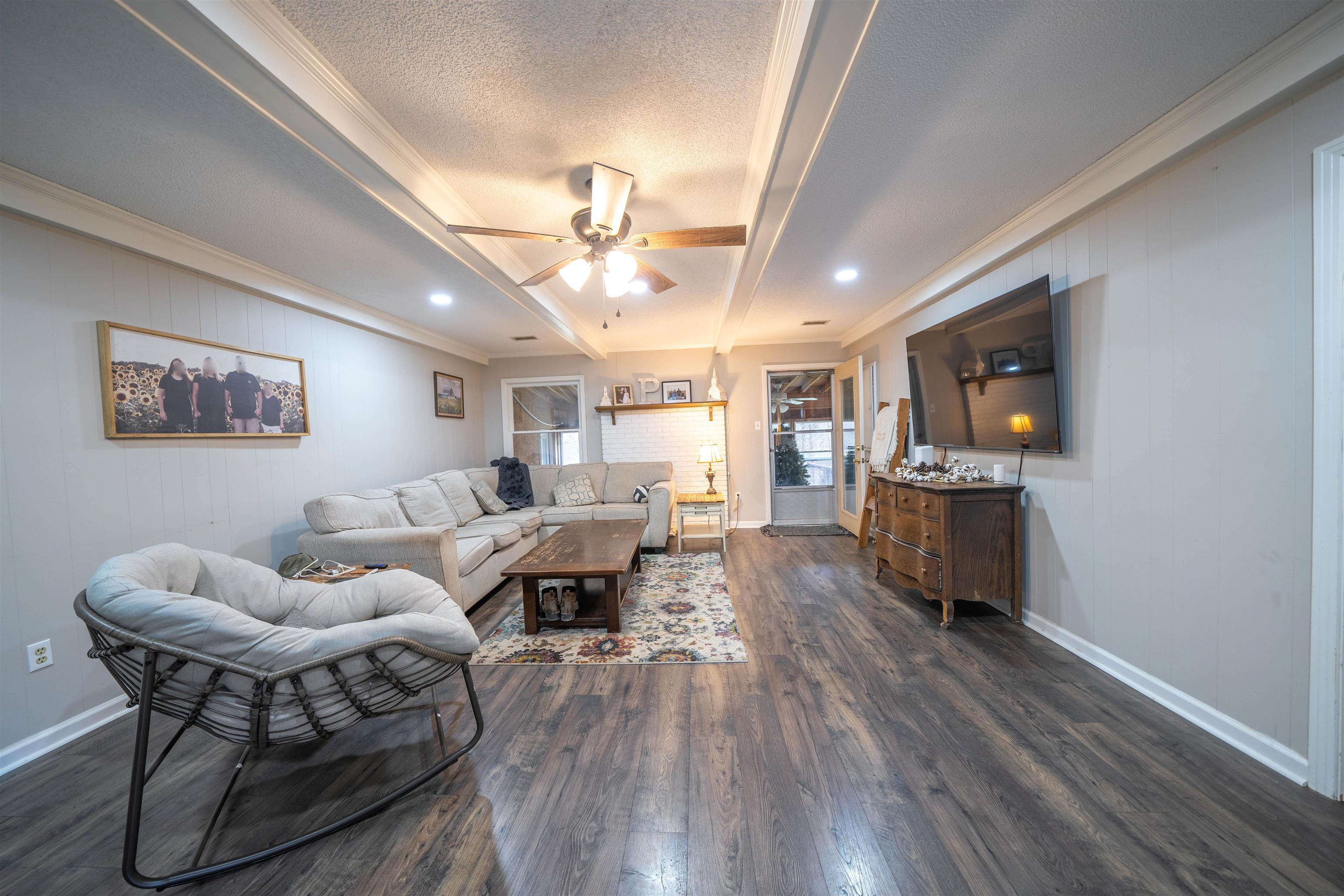 285 Woodbridge Road Somerville, TN 38068 - Photo 7 of 24 a living room with furniture and a flat screen tv