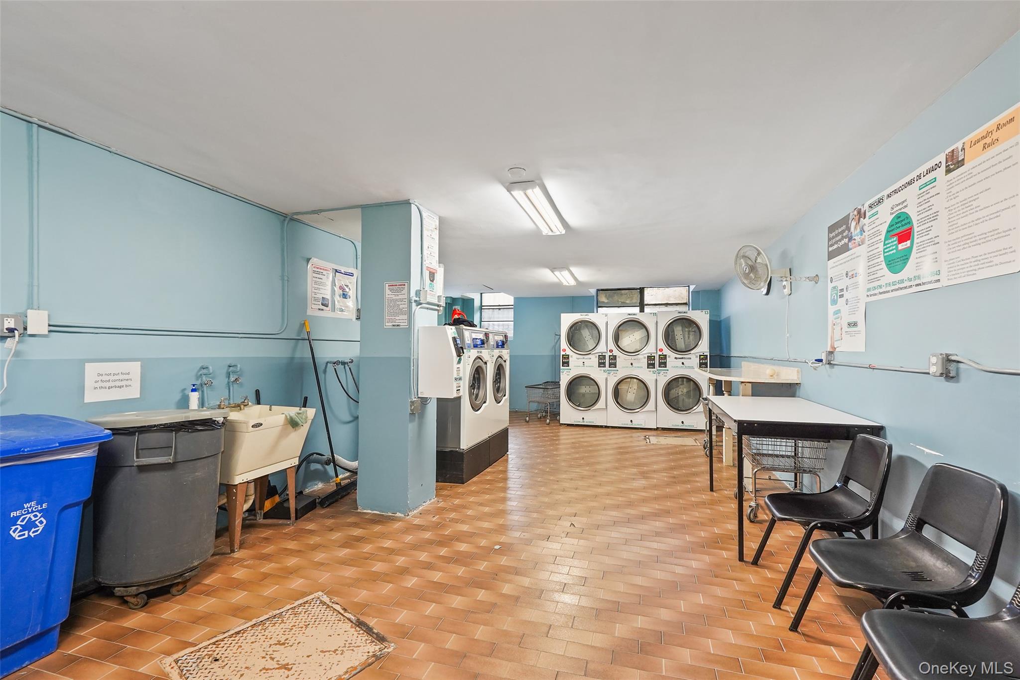 900 Palmer Road, Unit 5A Bronxville, NY 10708 - Photo 11 of 15 a kitchen with cabinets and wooden floor