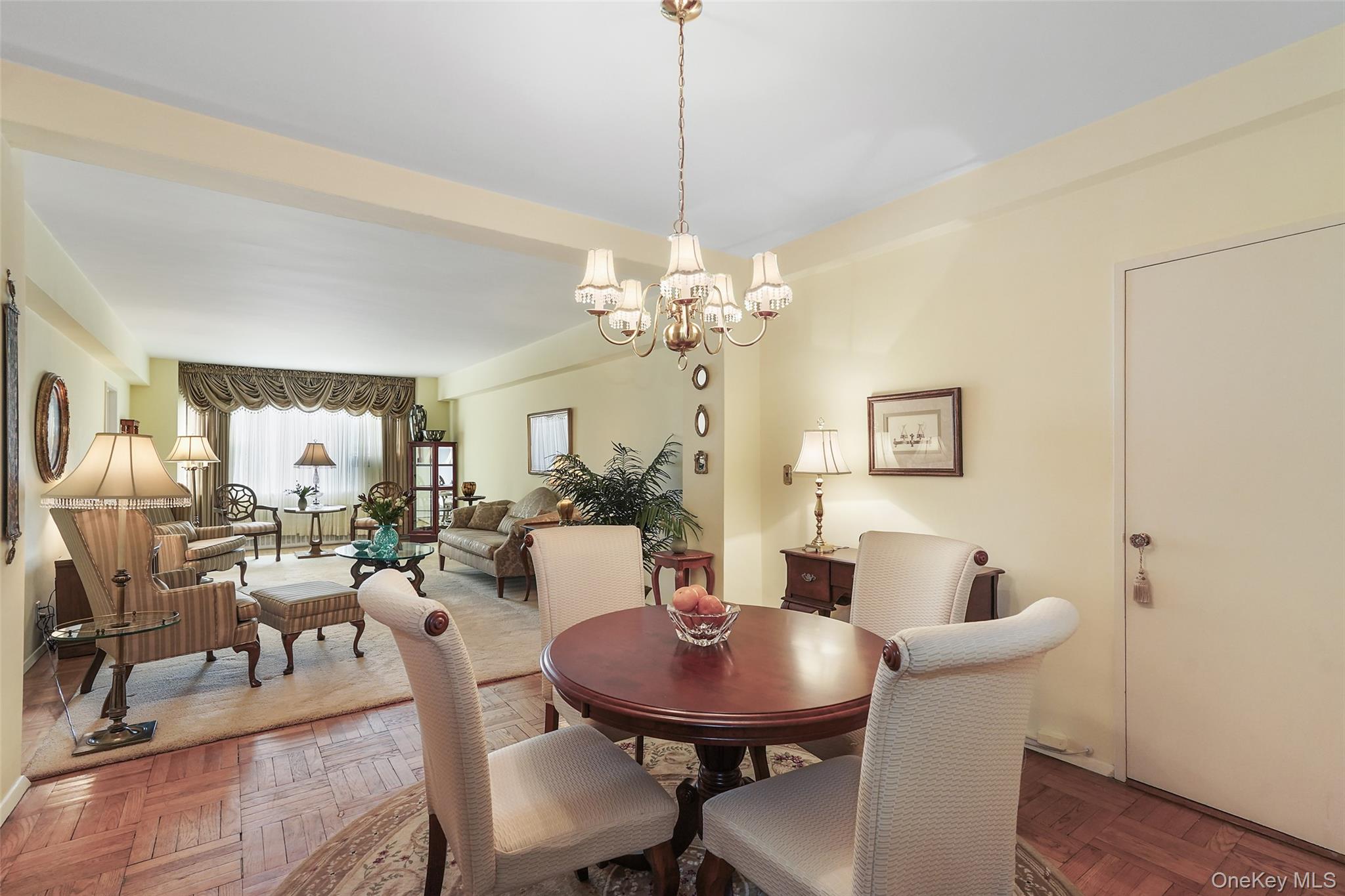 900 Palmer Road, Unit 5A Bronxville, NY 10708 - Photo 2 of 15 a view of a dining room with furniture and wooden floor