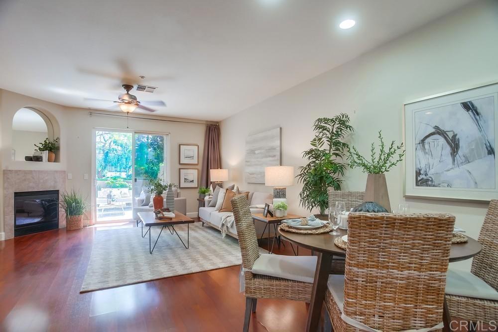 6094 Citracado Circle Carlsbad, CA 92009 - Photo 12 of 47 a living room with furniture and a fireplace