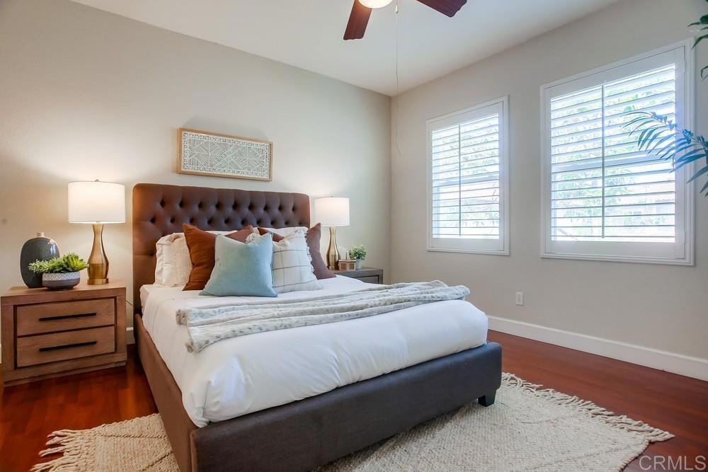 6094 Citracado Circle Carlsbad, CA 92009 - Photo 30 of 47 a bedroom with bed and window