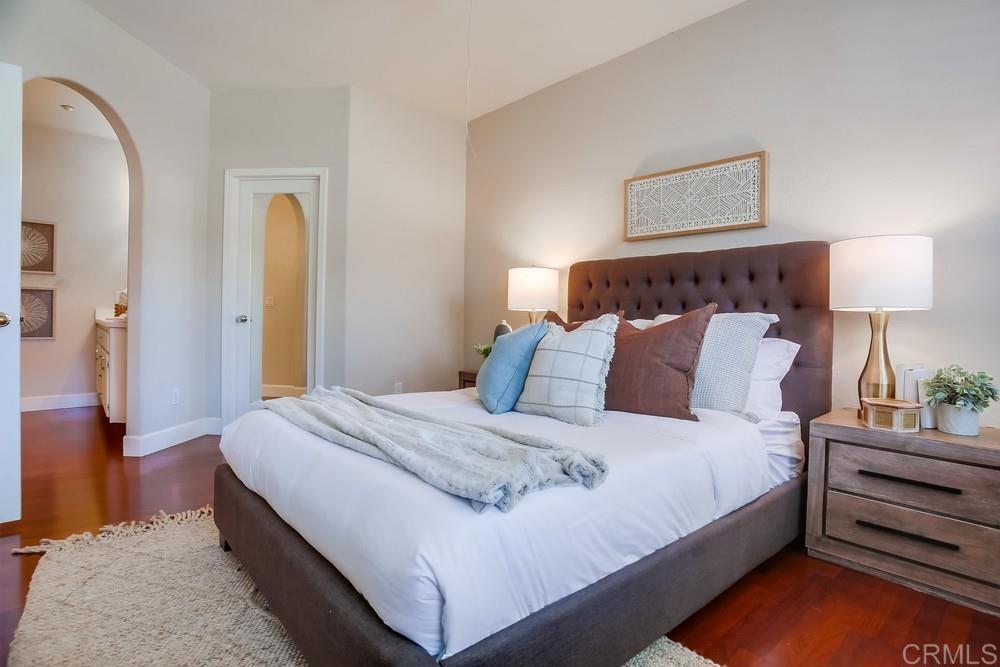 6094 Citracado Circle Carlsbad, CA 92009 - Photo 31 of 47 a bed room with a bed and a night stand