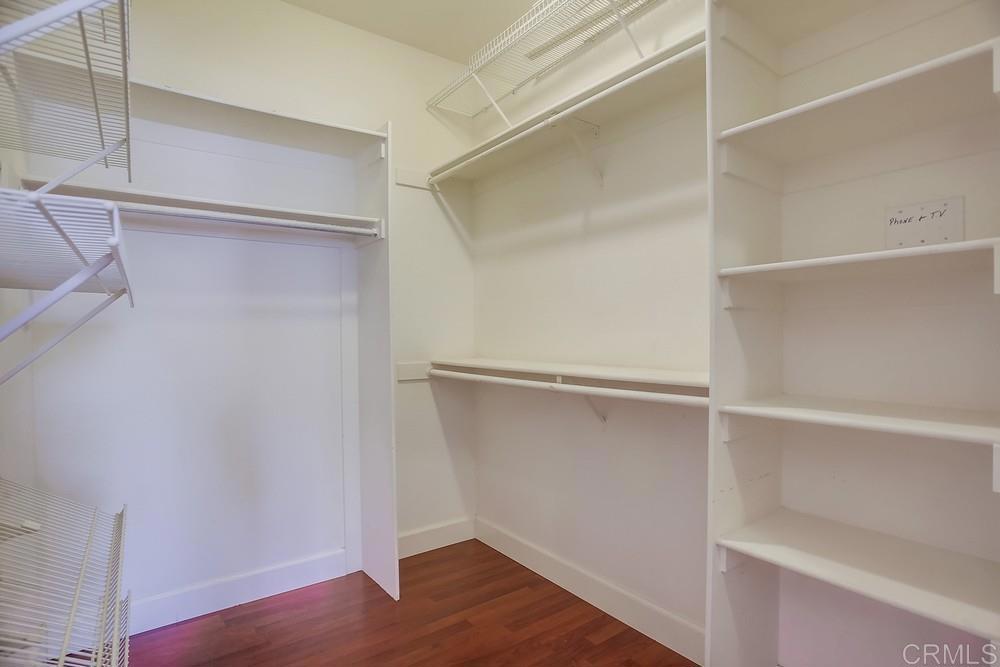 6094 Citracado Circle Carlsbad, CA 92009 - Photo 37 of 47 a view of an empty walk in closet