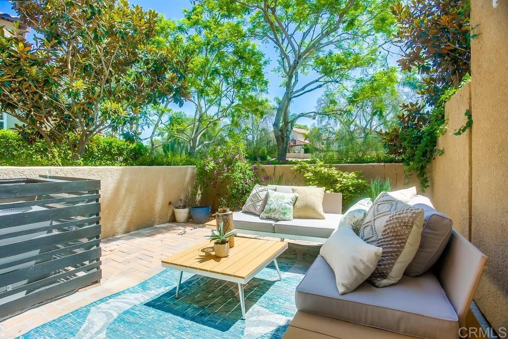 6094 Citracado Circle Carlsbad, CA 92009 - Photo 41 of 47 a backyard of a house with table and chairs