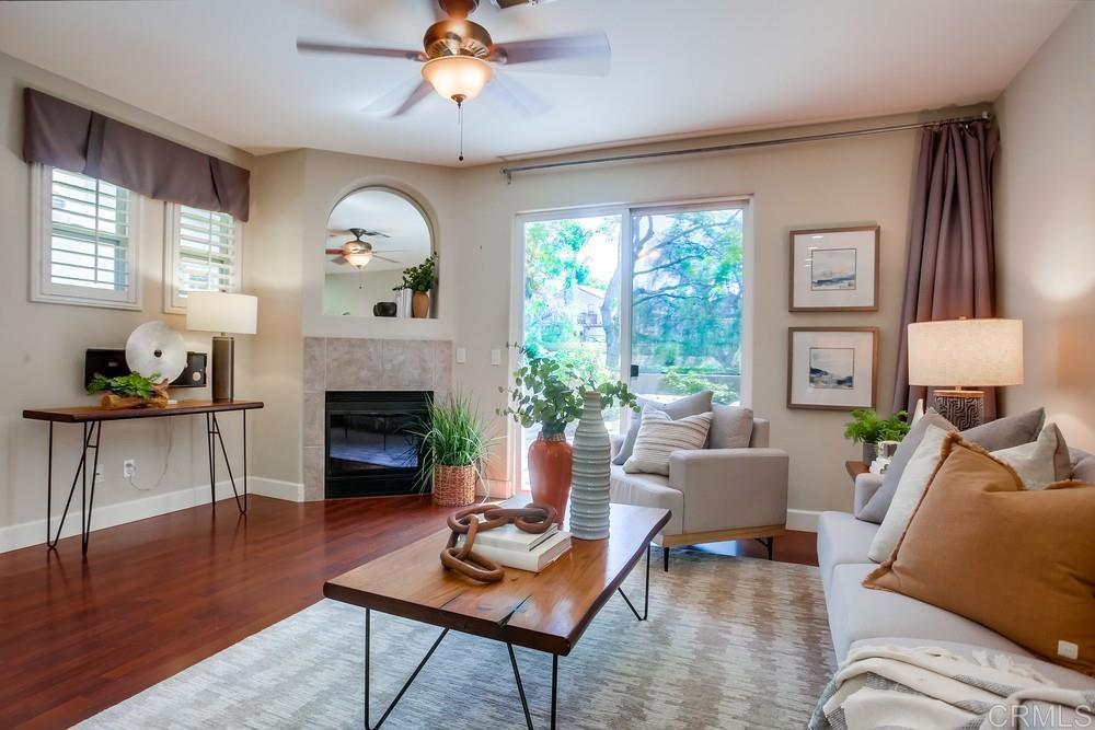 6094 Citracado Circle Carlsbad, CA 92009 - Photo 6 of 47 a living room with furniture and a fireplace