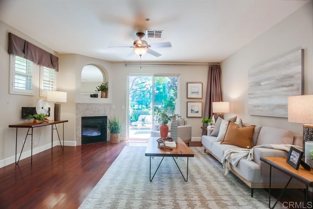 6094 Citracado Circle Carlsbad, CA 92009 - Photo 7 of 47 a living room with furniture fireplace and window