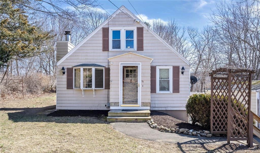 77 Candee Road Naugatuck, CT 06770 - Photo 1 of 1 a front view of a house with a yard