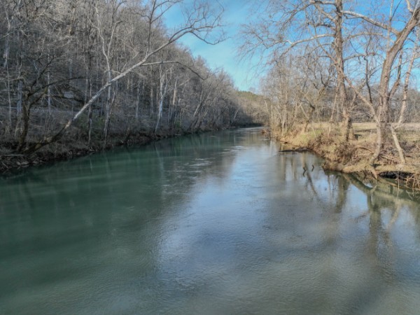 0 Tidwell Hollow Road Iron City, TN 38463 - Photo 3 of 44 a view of a lake in between two large trees