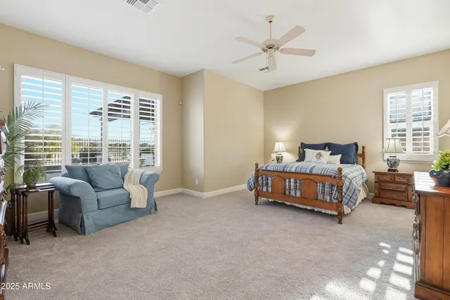 a view of living room with furniture and a window