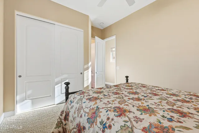 a bathroom with a sink a toilet a tub and shower