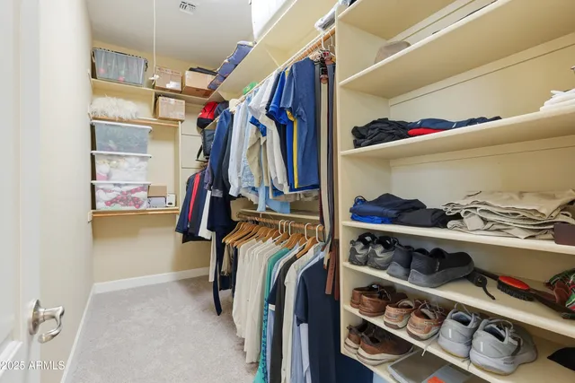 a view of a patio with a table chairs and a patio