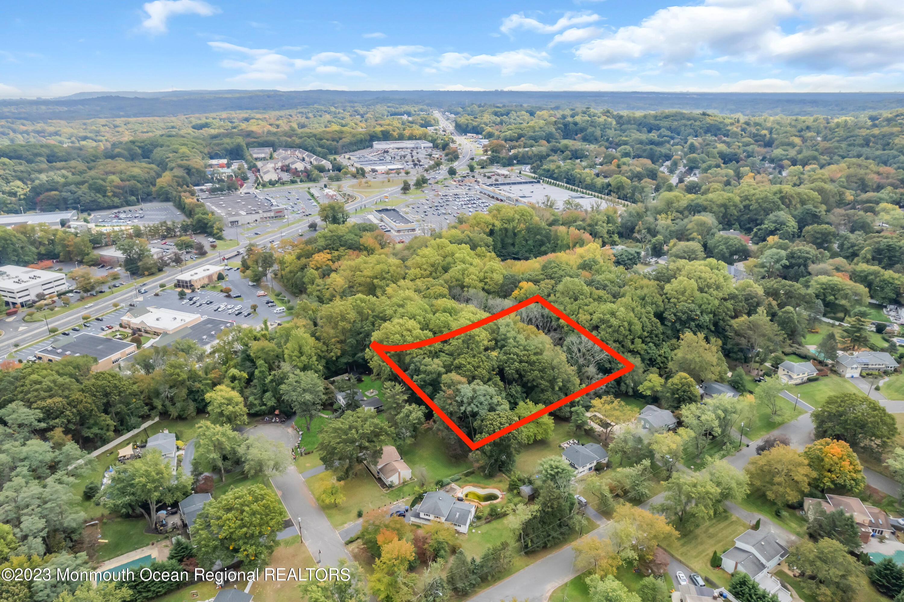 123-125 Magnolia Lane Middletown, NJ 07748 - Photo 3 of 11 an aerial view of a city