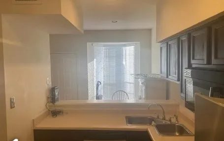 a bathroom with a sink and a bathtub