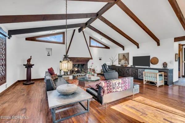 a view of livingroom with furniture and floor to ceiling window