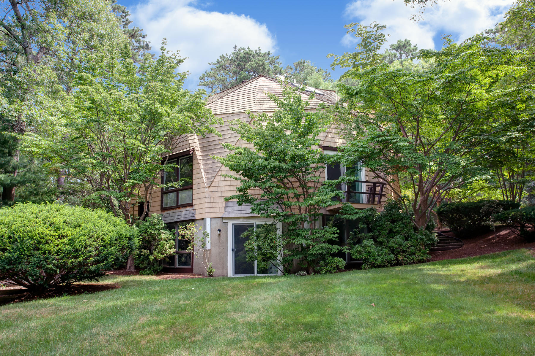 167 Ralyn Road Cotuit, MA 02635 - Photo 1 of 32 a view of a house with a garden