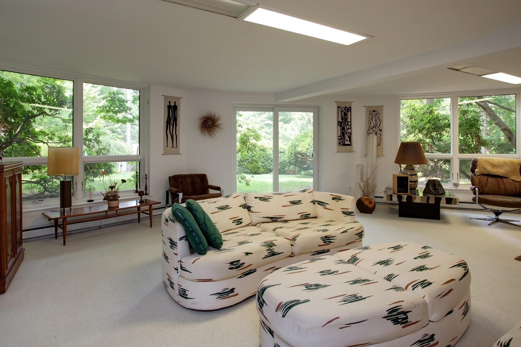 167 Ralyn Road Cotuit, MA 02635 - Photo 19 of 32 a bedroom with furniture and a large window