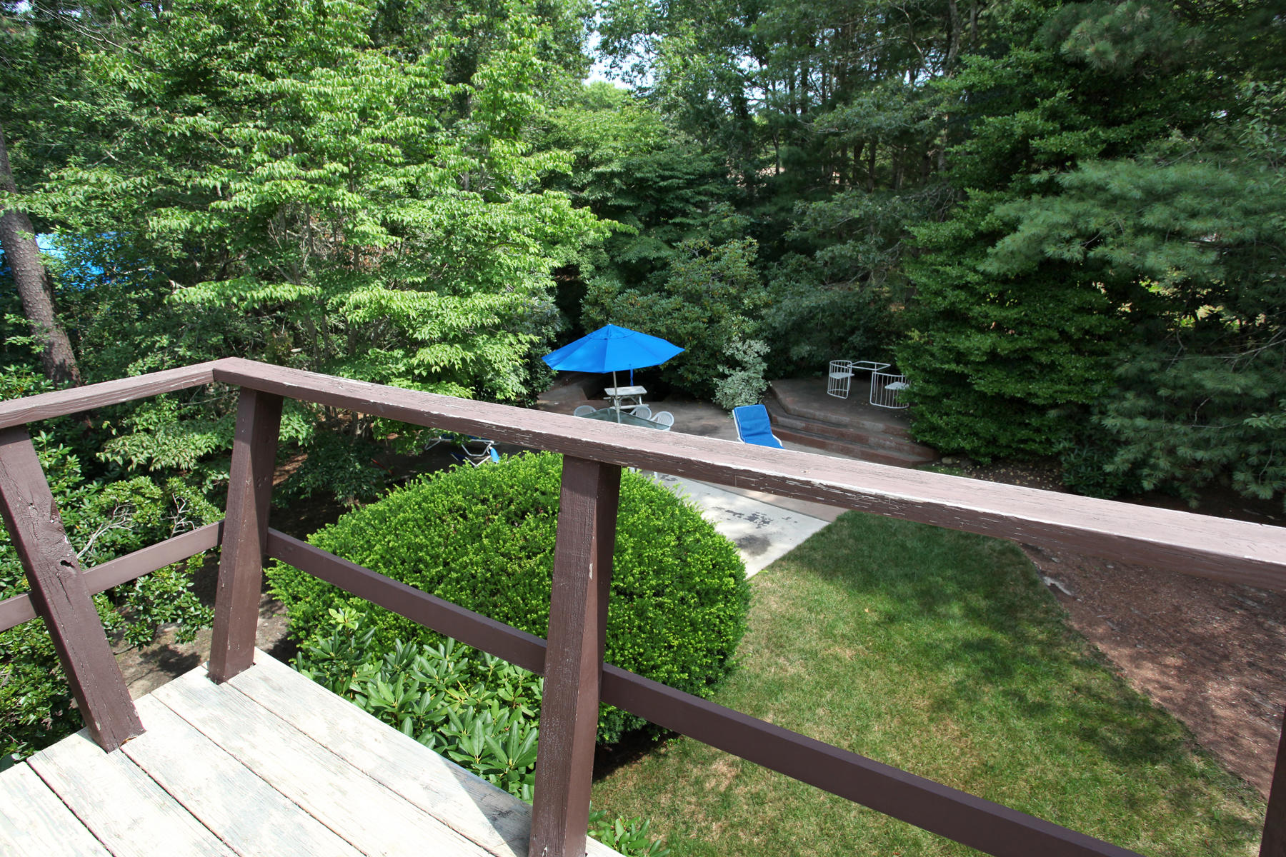 167 Ralyn Road Cotuit, MA 02635 - Photo 28 of 32 a view of a balcony with an outdoor space