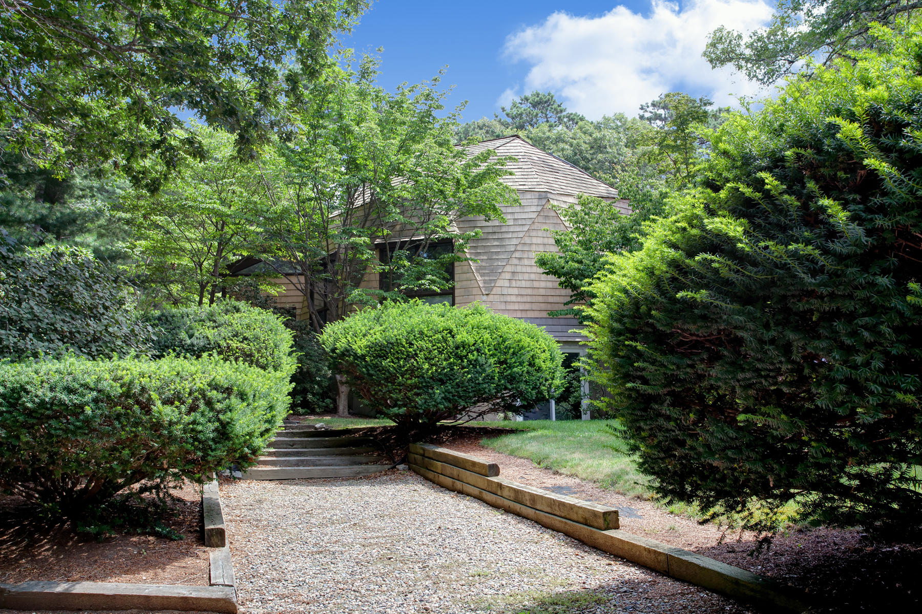 167 Ralyn Road Cotuit, MA 02635 - Photo 3 of 32 a view of a garden with plants