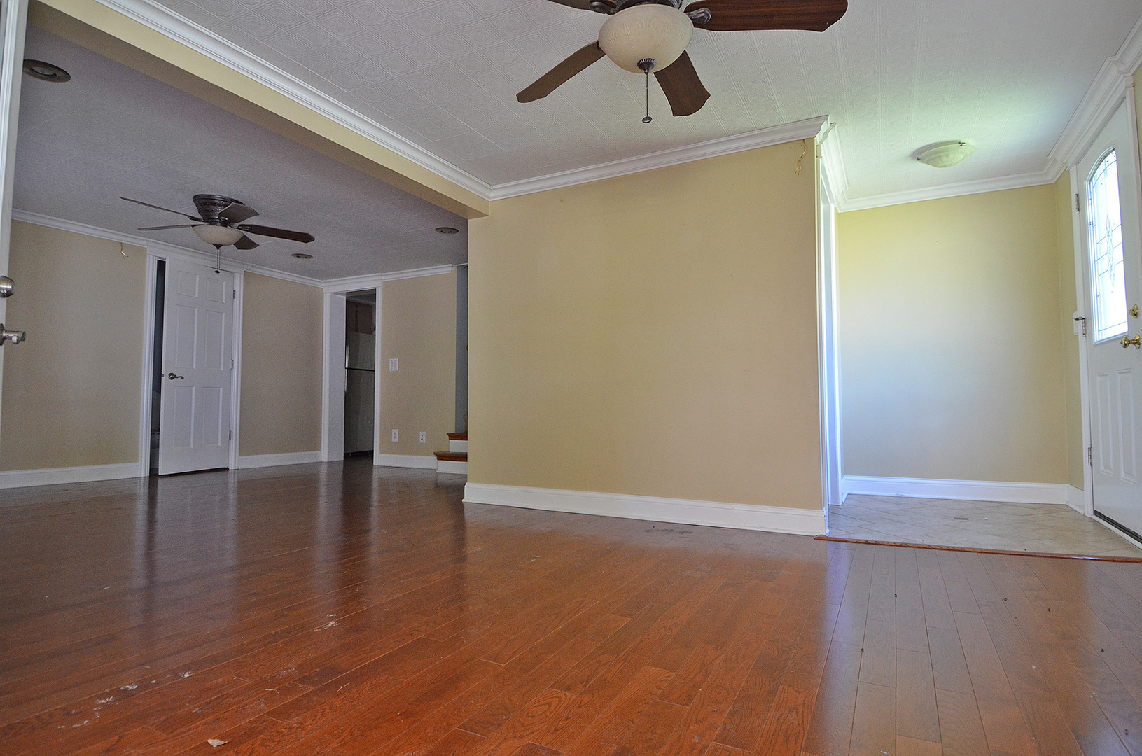 603 Clark Street Marseilles, IL 61341 - Photo 5 of 10 a view of an empty room with wooden floor