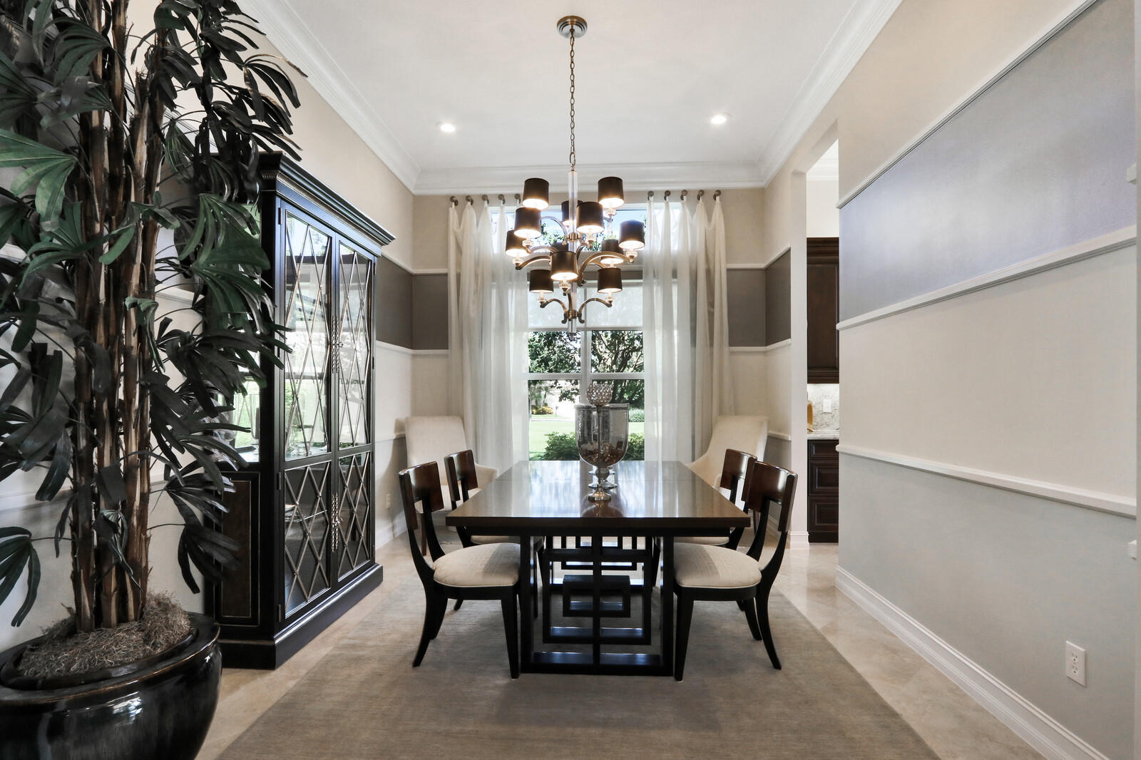 6967 Corning Circle Boynton Beach, FL 33437 - Photo 15 of 62 a dining room with furniture and window