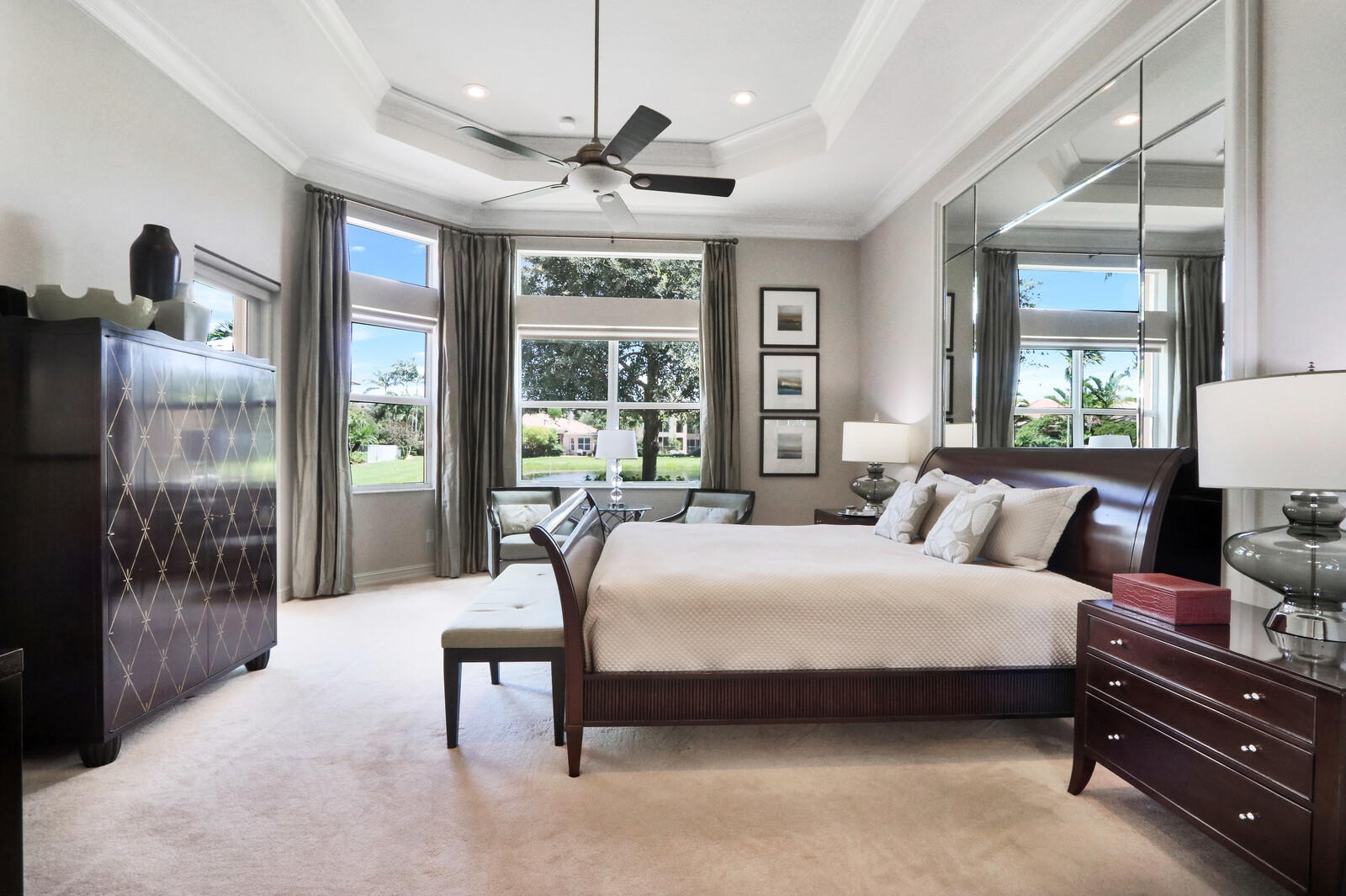 6967 Corning Circle Boynton Beach, FL 33437 - Photo 22 of 62 a bedroom with a bed and large window