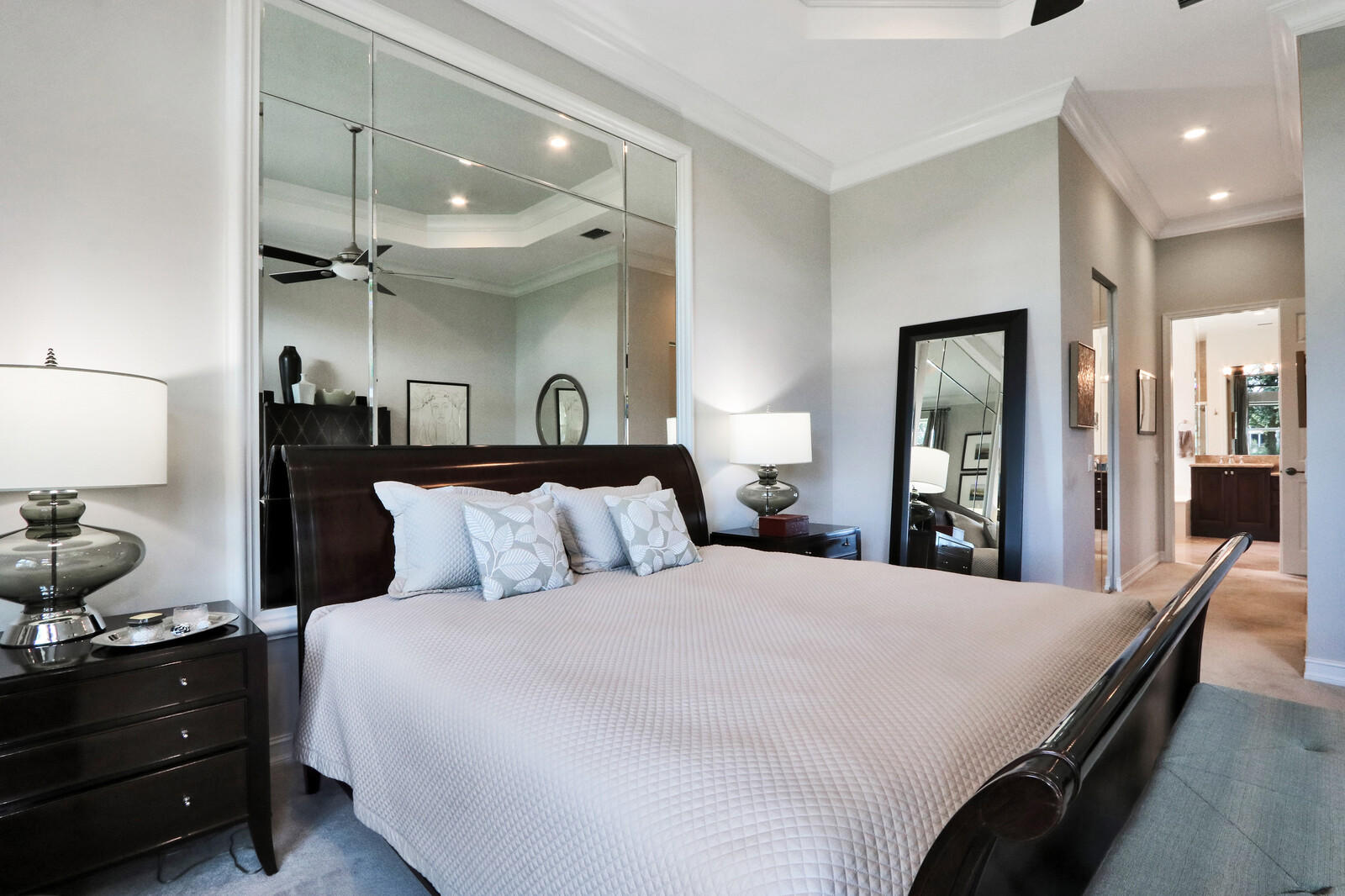 6967 Corning Circle Boynton Beach, FL 33437 - Photo 24 of 62 a bedroom with a bed and window with lamp