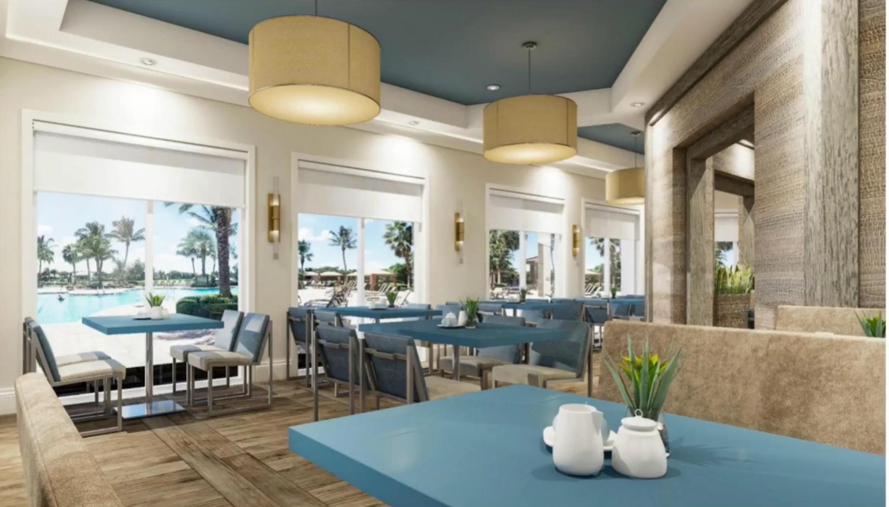 6967 Corning Circle Boynton Beach, FL 33437 - Photo 49 of 62 a living room with lots of furniture and a large window