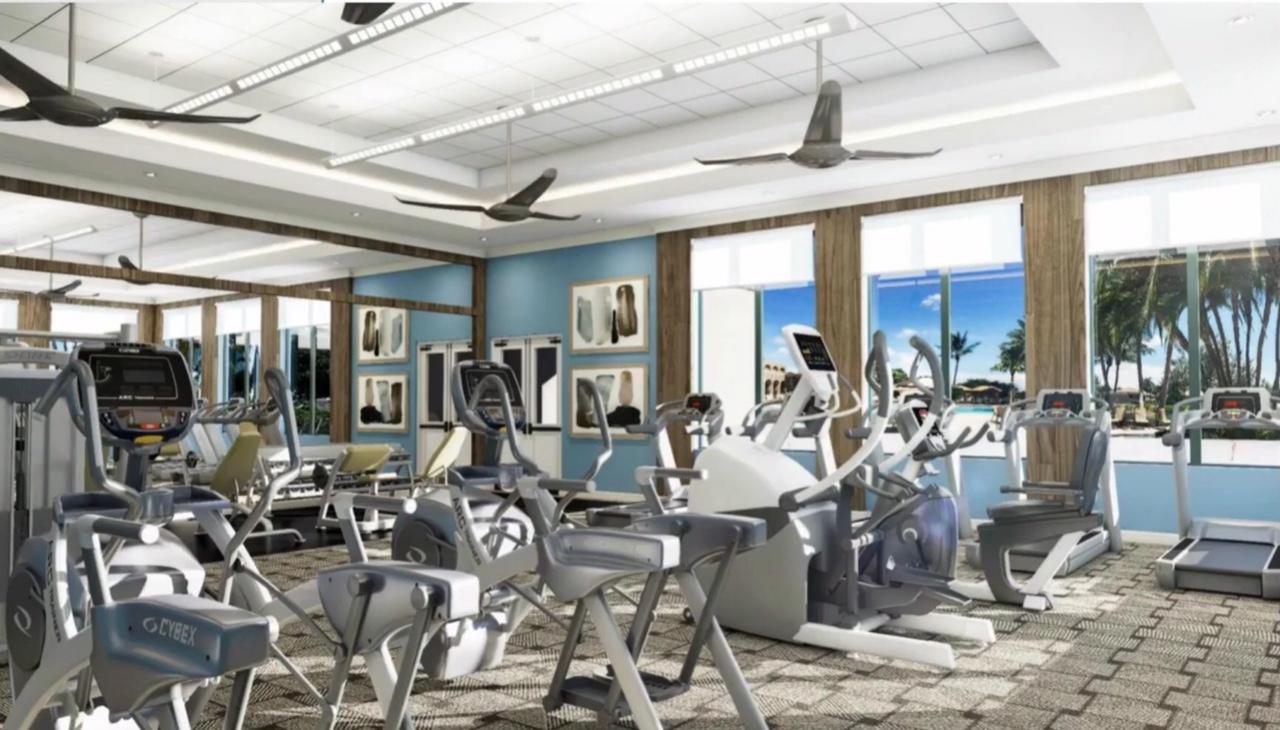 6967 Corning Circle Boynton Beach, FL 33437 - Photo 55 of 62 a very nice looking room with lots of glass windows