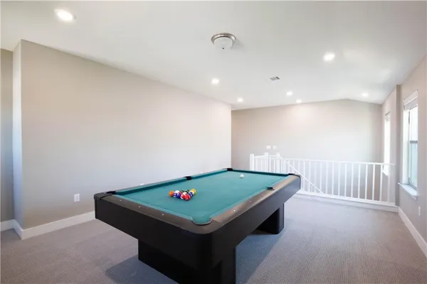 a room with pool table