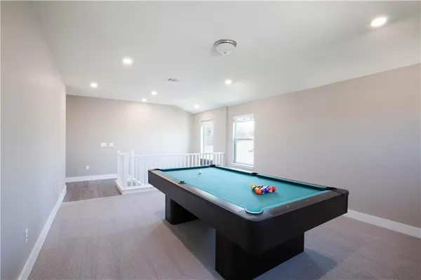 a room with pool table