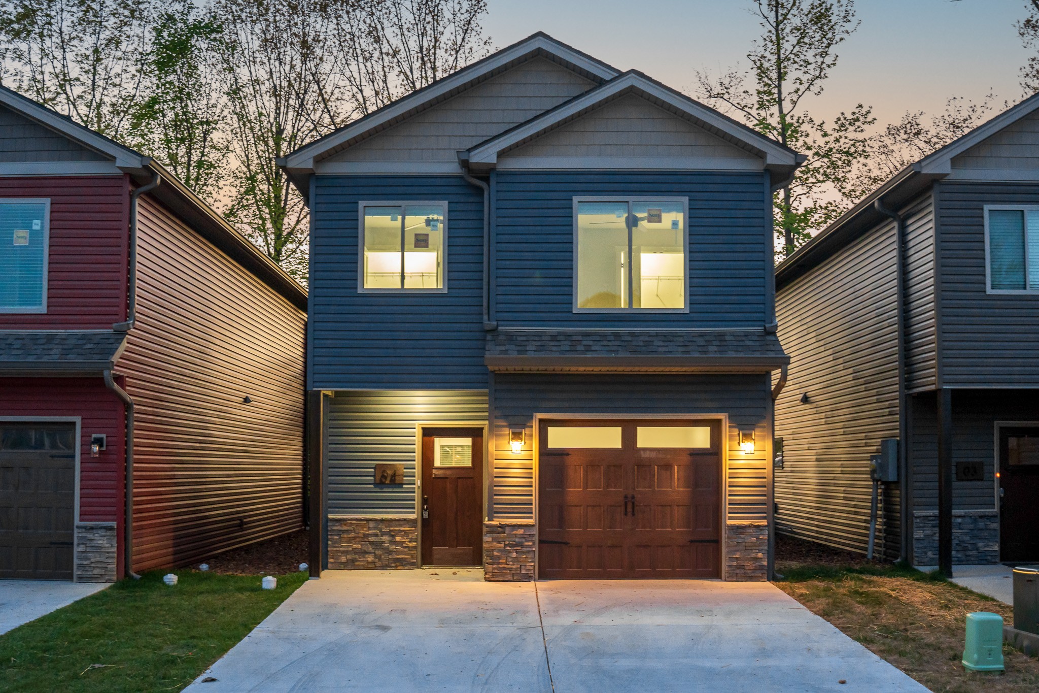 a front view of a house with a garage