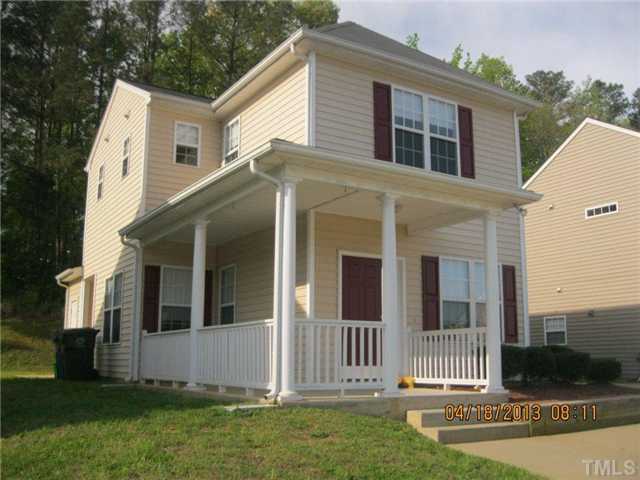 5908 Wynmore Road Raleigh, NC 27610 - Photo 2 of 7 a view of a house with backyard and porch