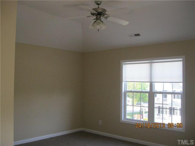 5908 Wynmore Road Raleigh, NC 27610 - Photo 7 of 7 an empty room with a window