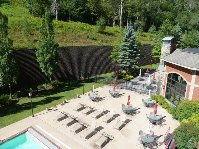 a view of a table and chairs in the patio