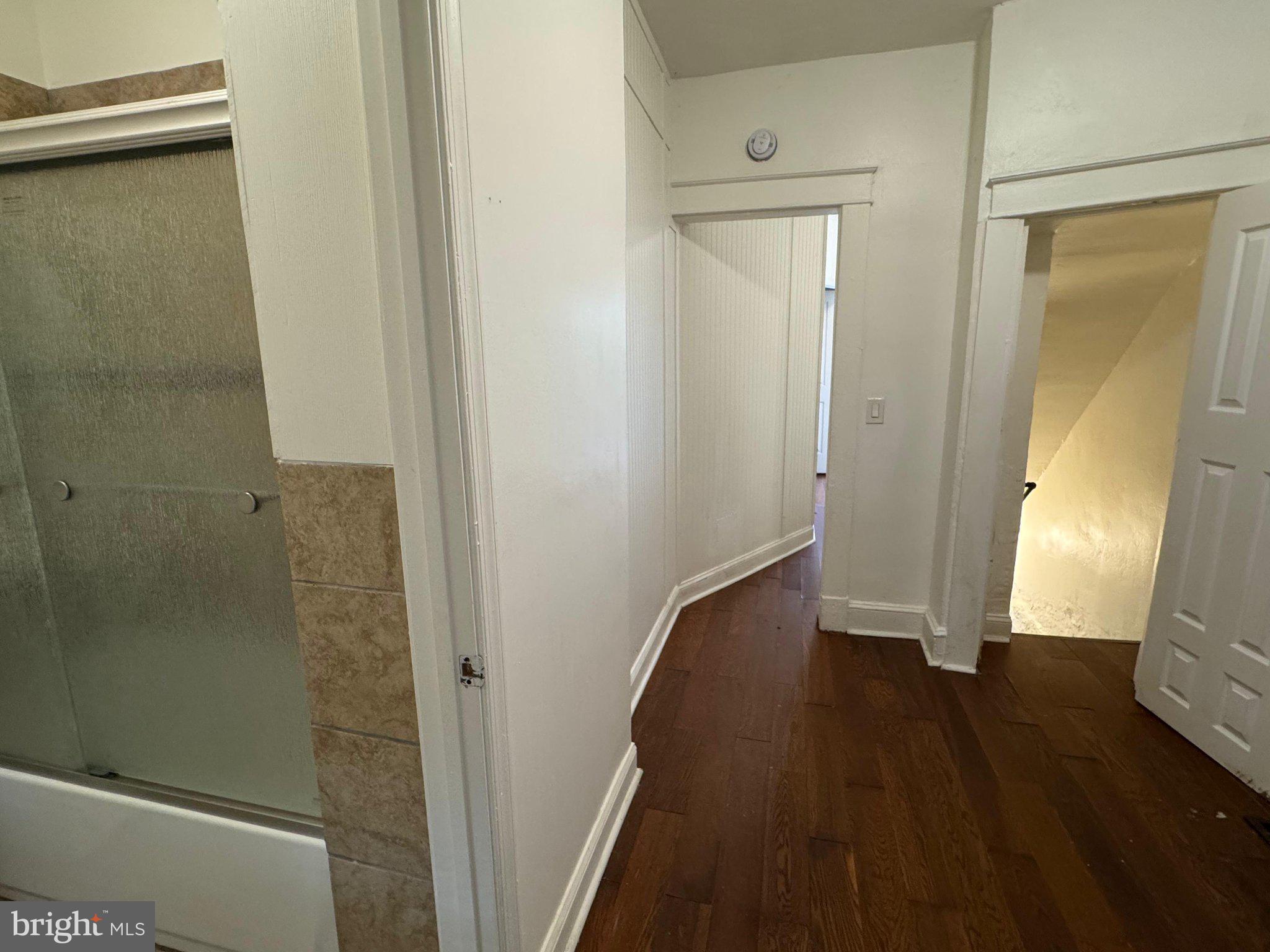 707 Denison Street Baltimore, MD 21229 - Photo 6 of 18 Bright and inviting hallway retreat.